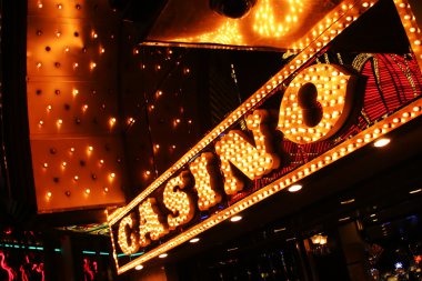 Blackjack live-dealer table with cards and chip stacks